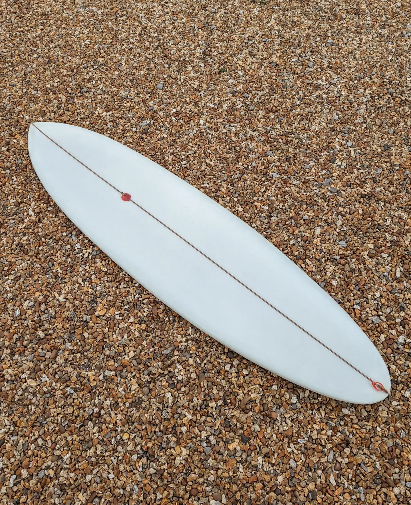 Eggspiracy surfboard deck and rail view by Whitburn Studio.