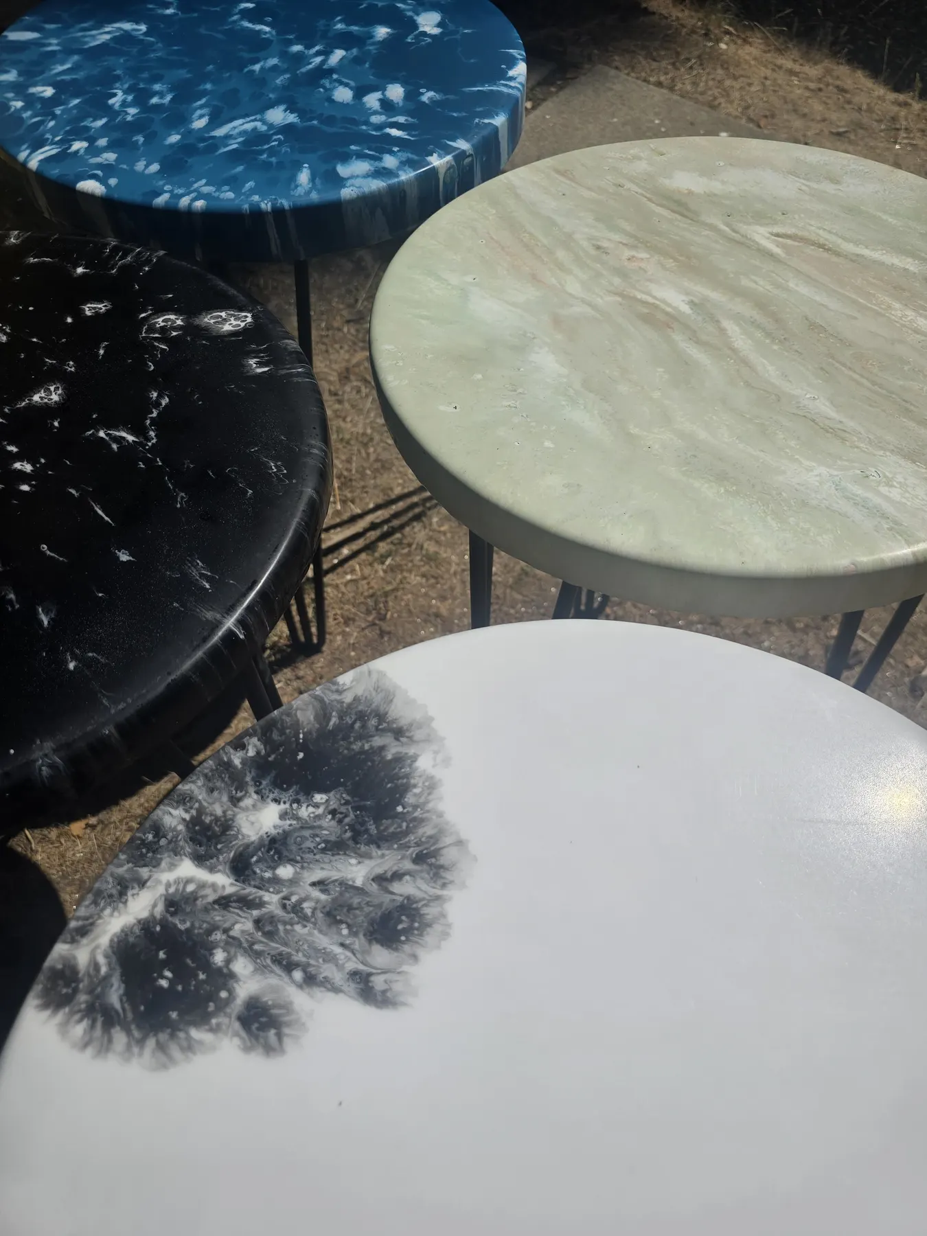 Round table made from surfboard fibreglass offcuts and resin.